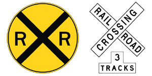 此标志提醒驾驶员正在接近铁路道口，千万不要尝试在栏杆拦下前冲过铁路或停超过栏杆。图中X型牌下方的数字代表有多少铁轨。